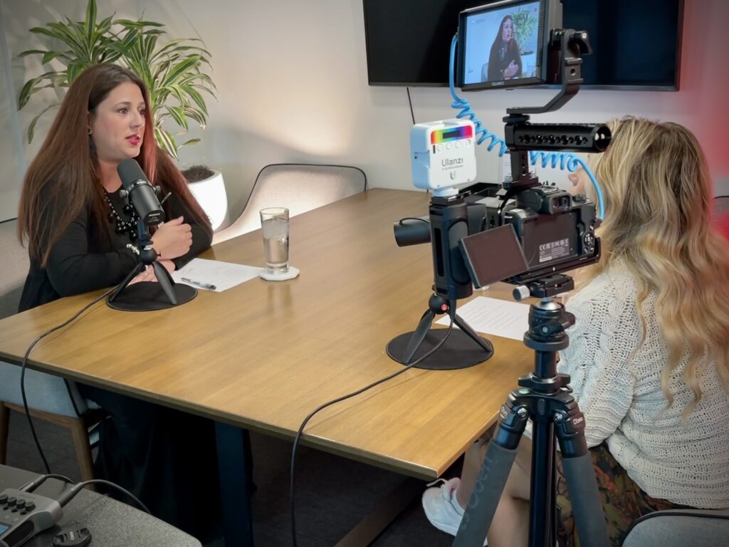 Attorney Beatriz Godoy on the set of the Immigration Nation Podcast